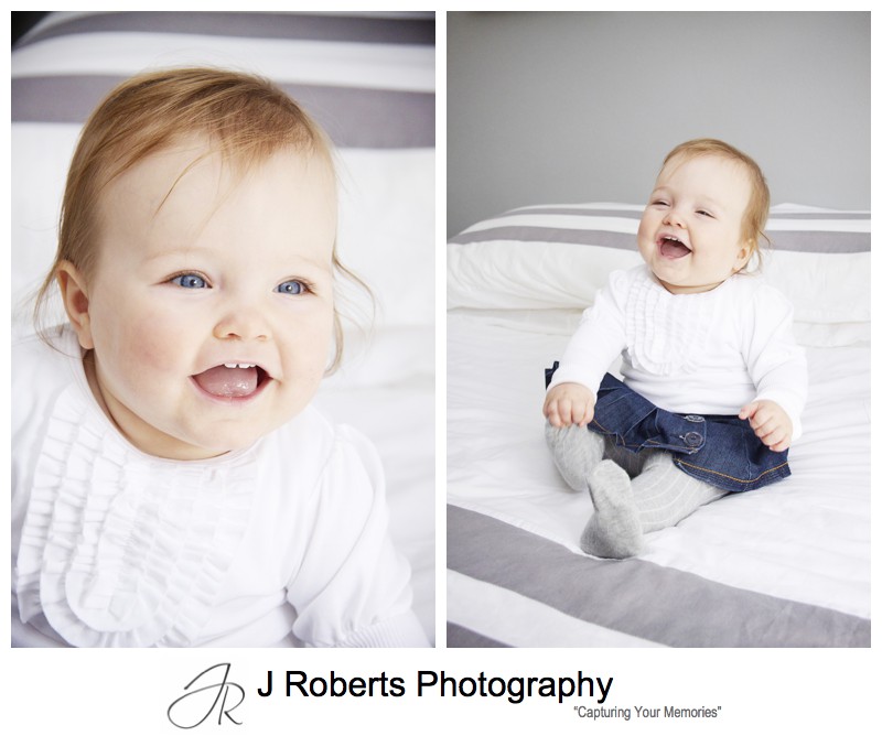Little girl laughing on a bed - family portrait photography sydney